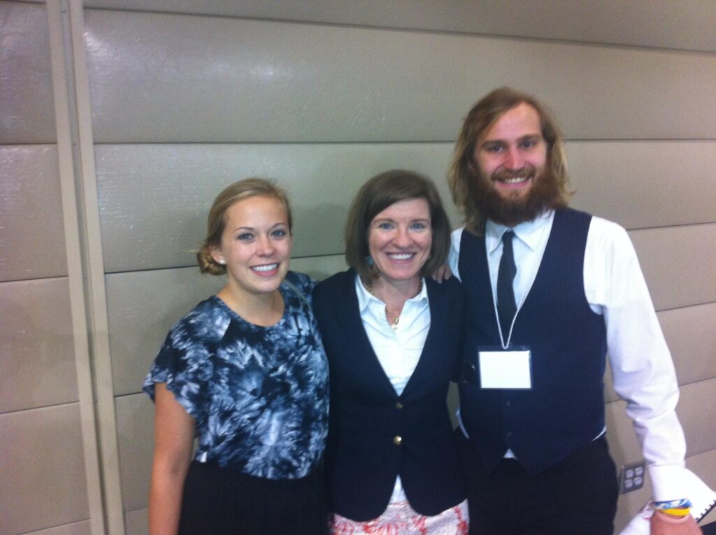 Jess at conference with advisor and co-author.